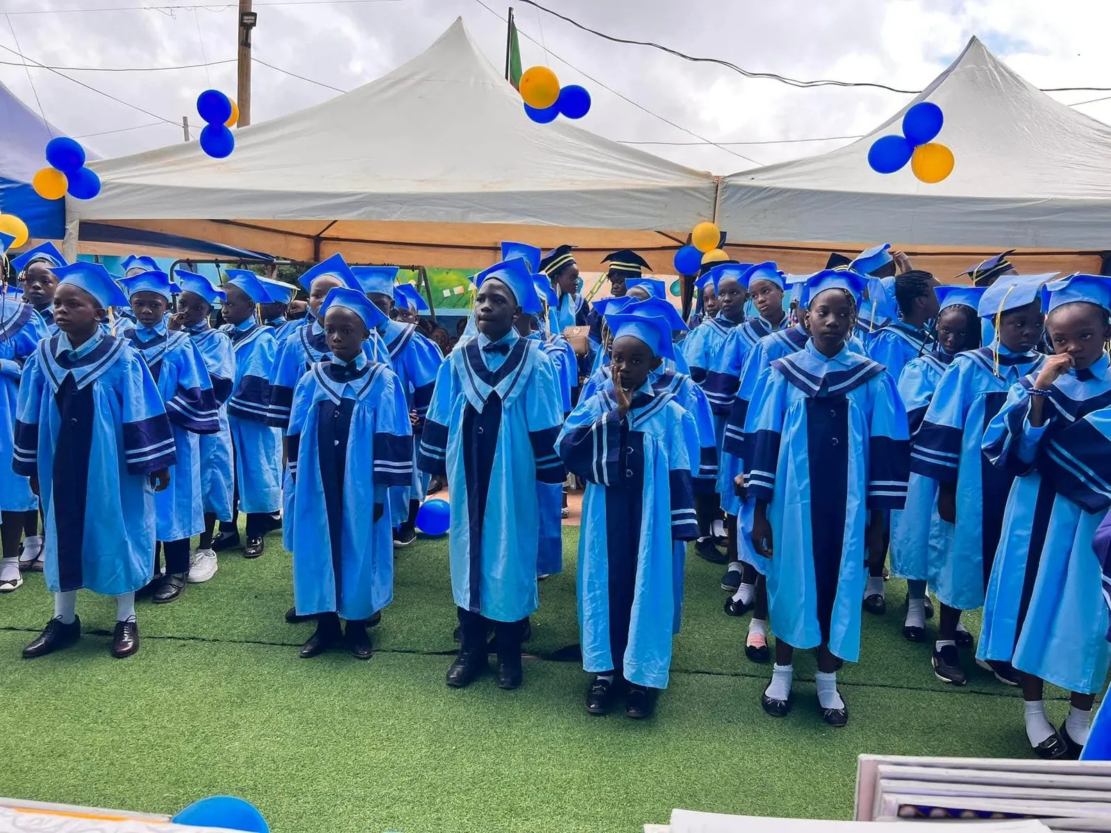 BGS students in graduation gowns at the annual end-of-year ceremony